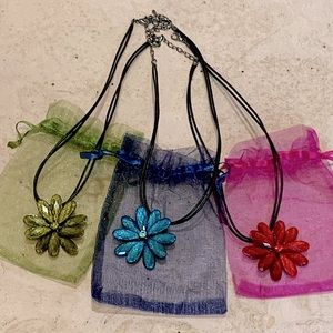 Flower Power 🌸 Necklaces green,blue,red/pink on black cords with clasps